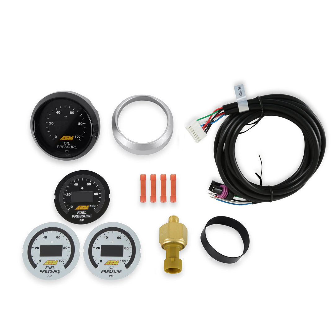 Collection of automotive gauges and components on a white background