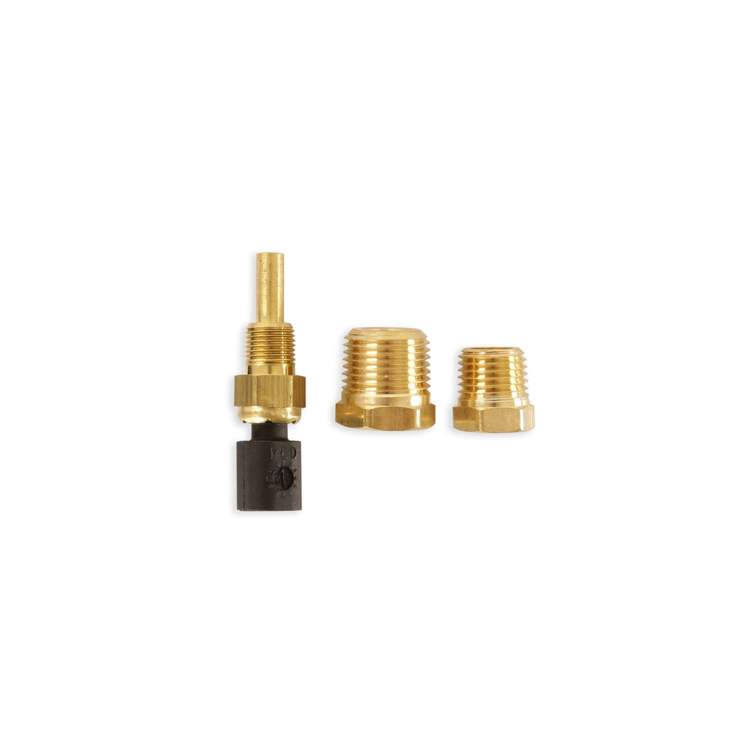 Set of brass plumbing components on a white background