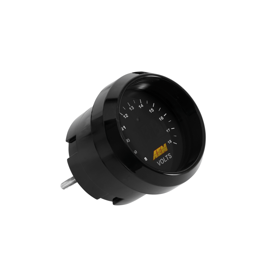 A black automotive voltmeter gauge with a silver metal terminal on the side, featuring white markings and a yellow 'ASM' brand logo on the dial, set against a plain white background.