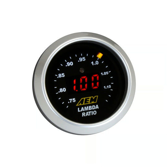A circular AEM Lambda Ratio gauge with a silver bezel, black face, red LED display showing &