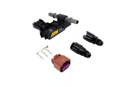 A set of automotive wiring or fuel injection components on a white background, including a black main module with a yellow ABB logo, two black connector pieces, a small silver wire, and a brown connector with a purple internal terminal.