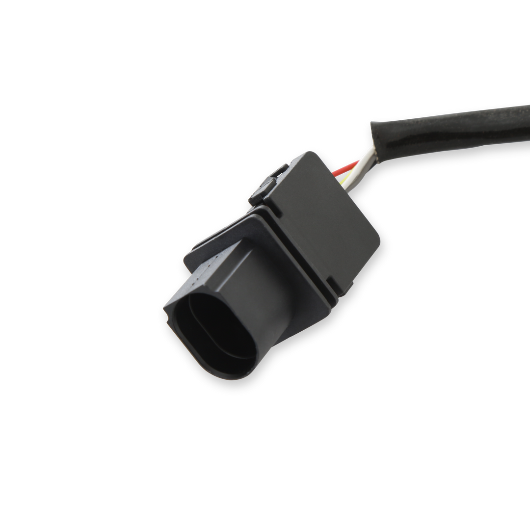 A black plastic electrical connector with a multi-pin female socket and a black cable jacket, showing a red wire and a silver wire at the exposed end, on a white background.
