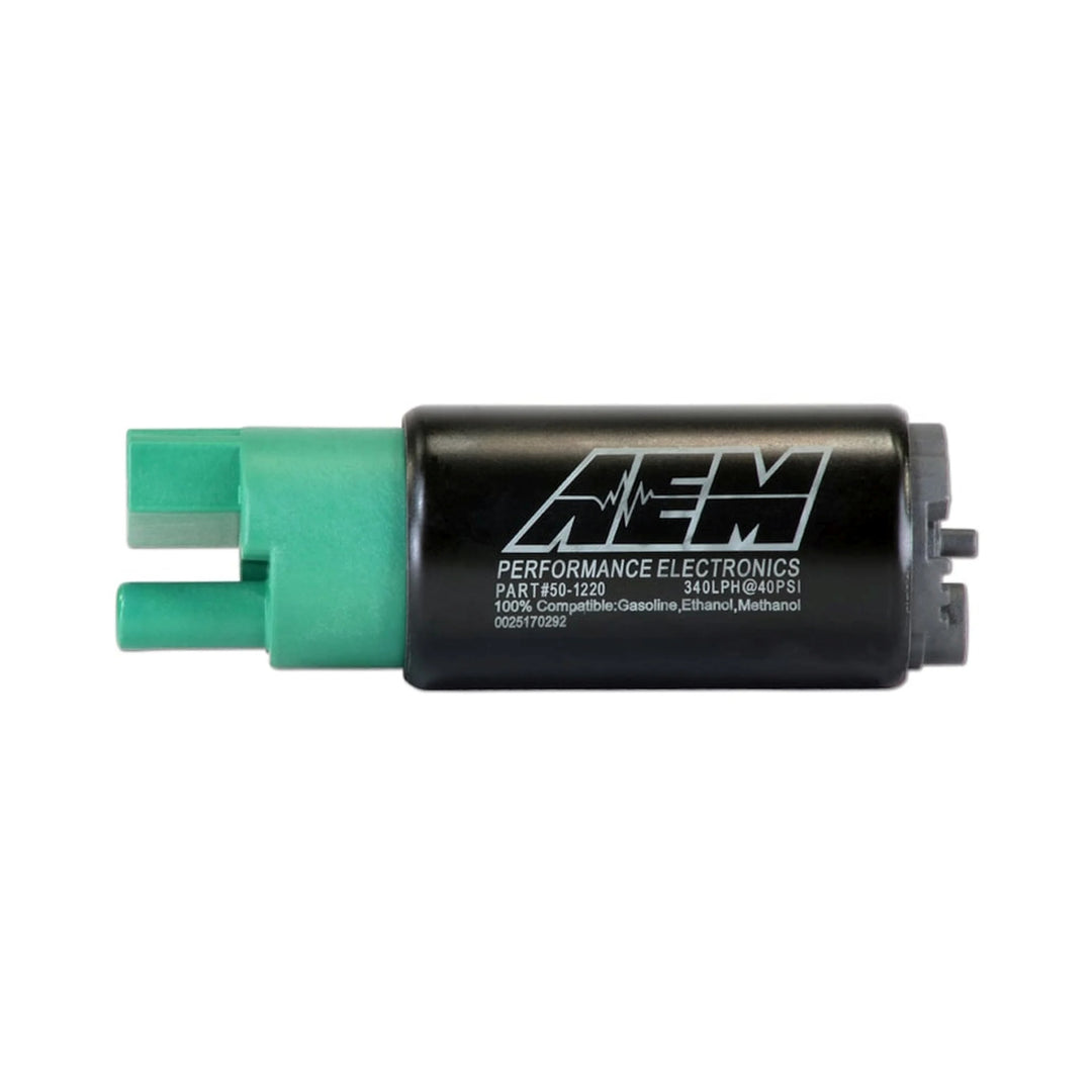 Performance electronics component with green connectors on a white background