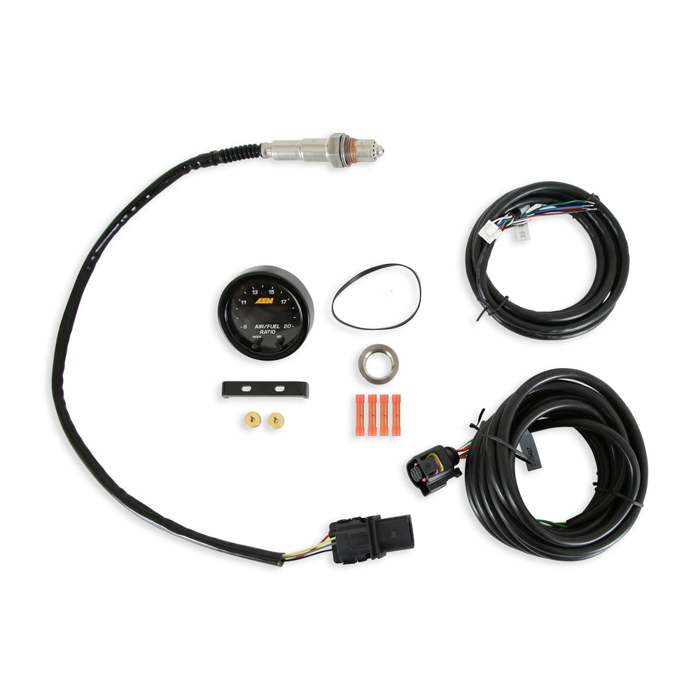 Automotive diagnostic kit with various components on a white background