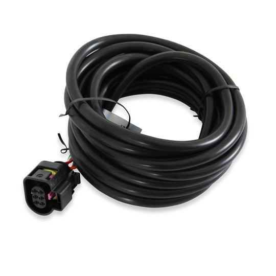 Coiled black cable with connectors on a white background