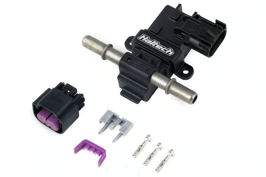 Automotive parts including a black connector and purple clip on a white background